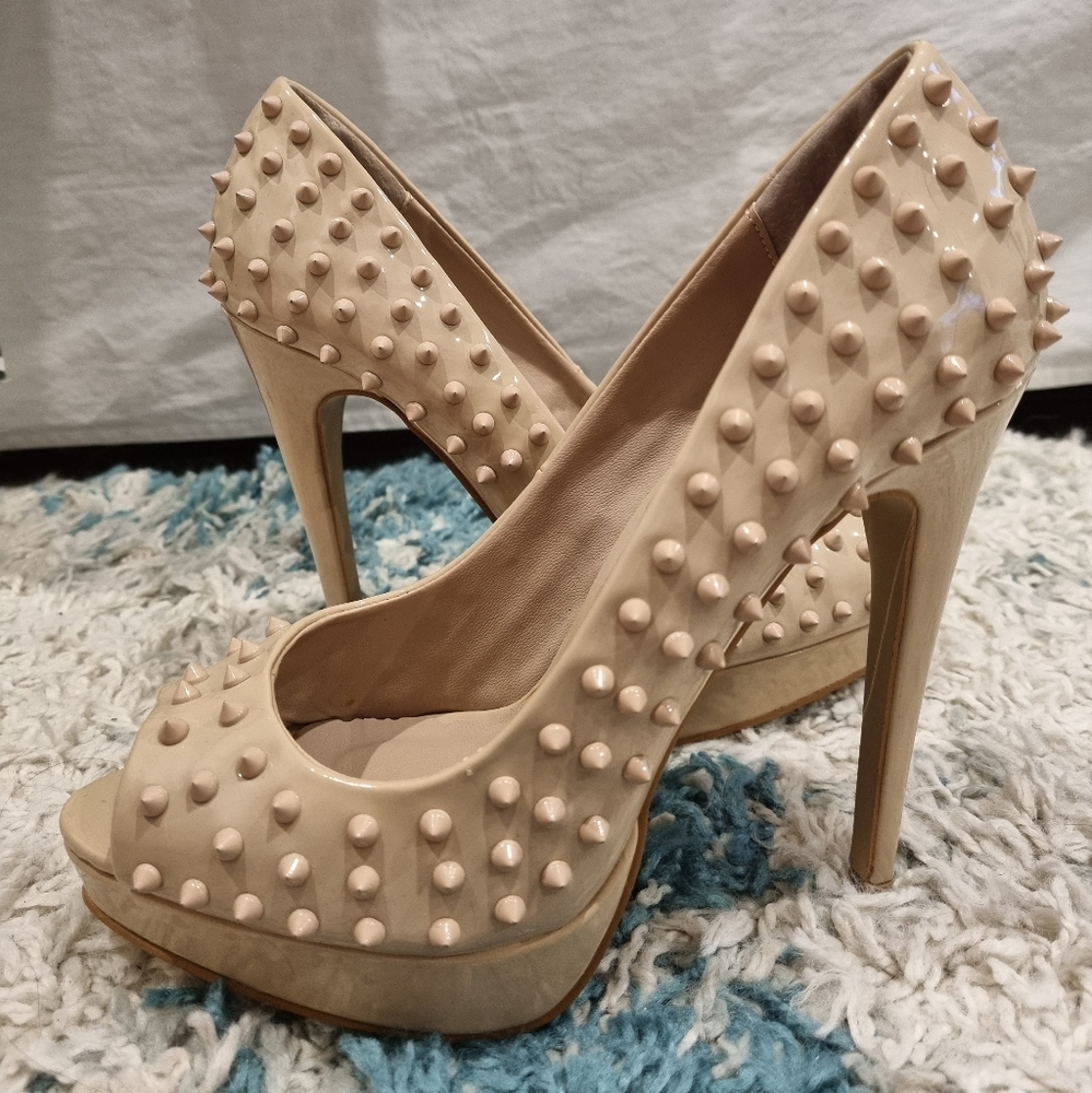 Aldo spiked nude heels size 8.5